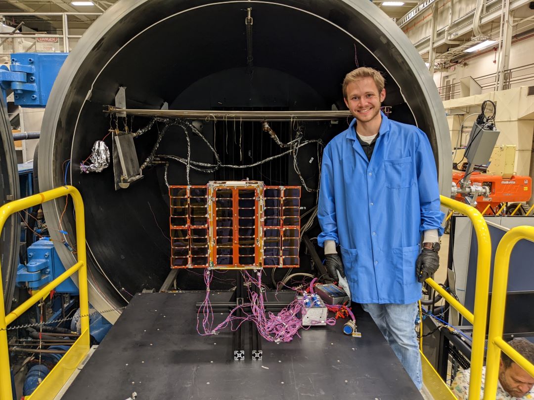 Seth Abramczyk setting up a Cube Satellite thermal vacuum test.